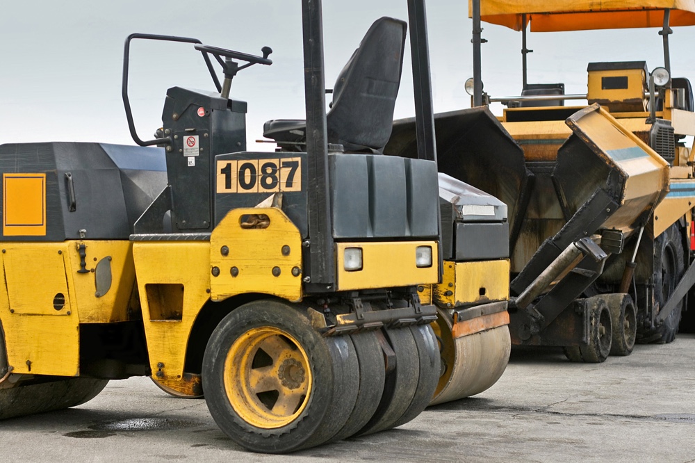 Road construction roller heavy equipment machinery yellow